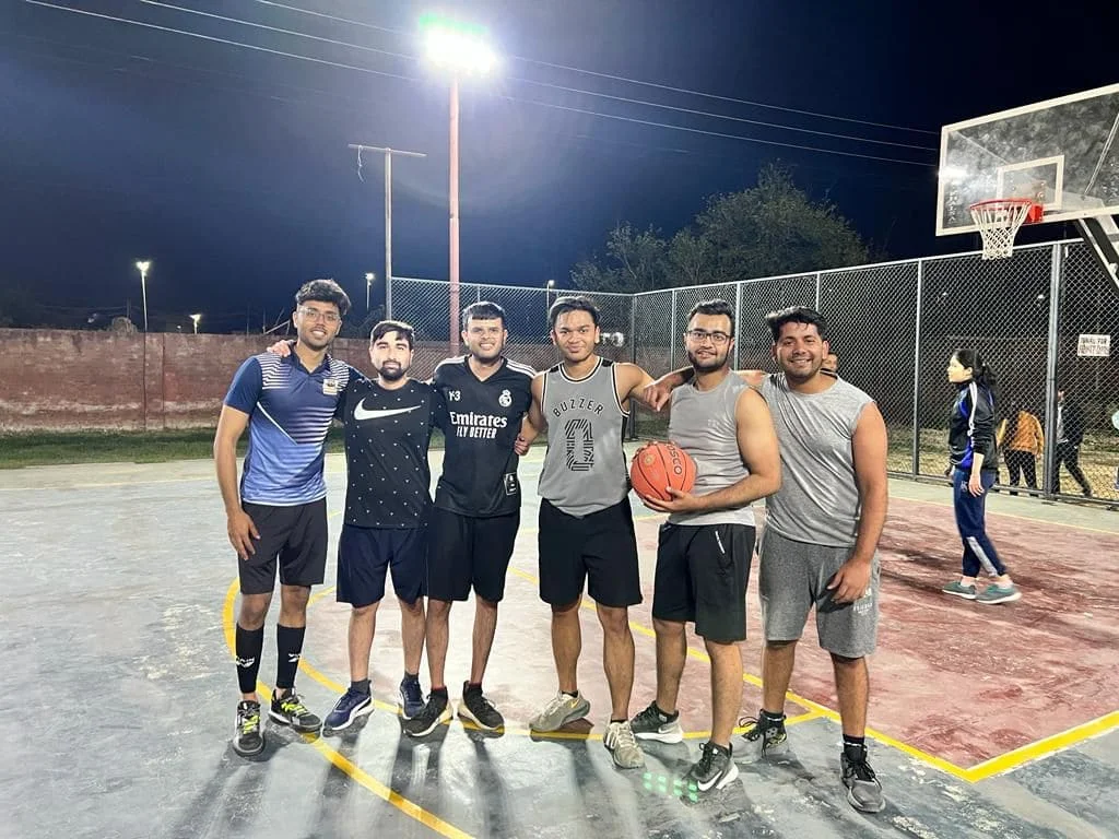 Six people with basketball